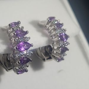 925, 14k white gold Tanzanite snap on earrings.